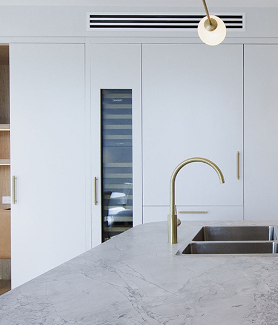 Limestone worktops can give a kitchen a fresh, clean appearance.