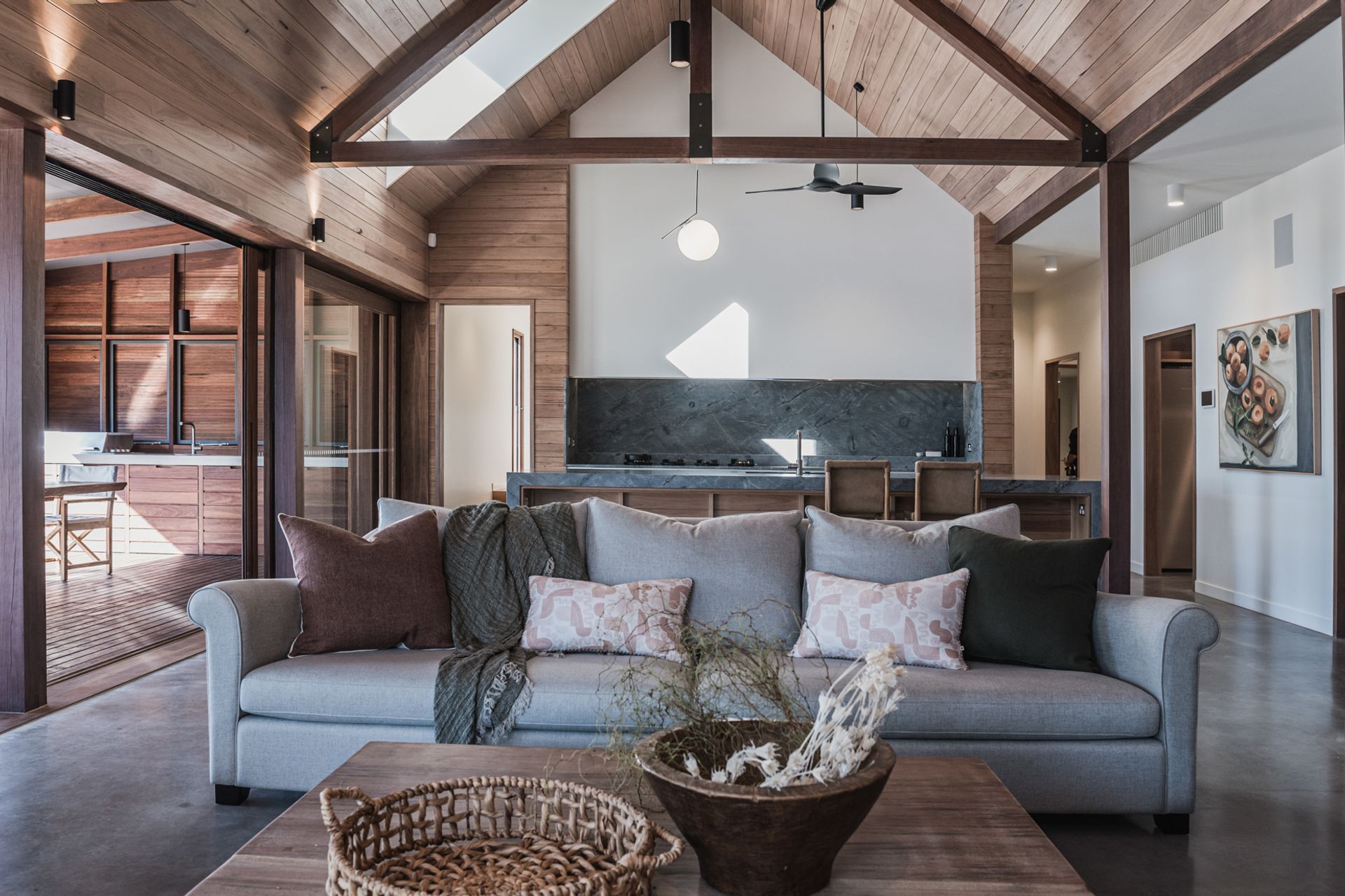 Rustic open-plan living areas offer families a spacious and versatile environment, blending functionality with a timeless, rugged style.