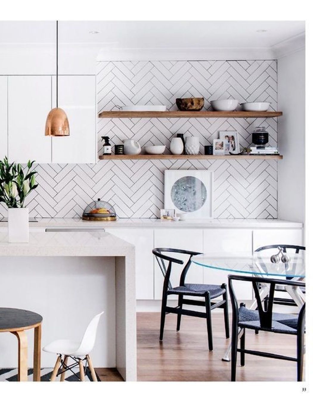 This kitchen features simple white subway tiles but the way they are installed is what actually adds a design element to an otherwise simple kitchen design. (Tile Depot 2021)