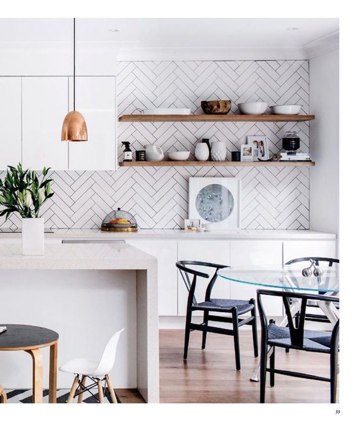 This kitchen features simple white subway tiles but the way they are installed is what actually adds a design element to an otherwise simple kitchen design. (Tile Depot 2021)