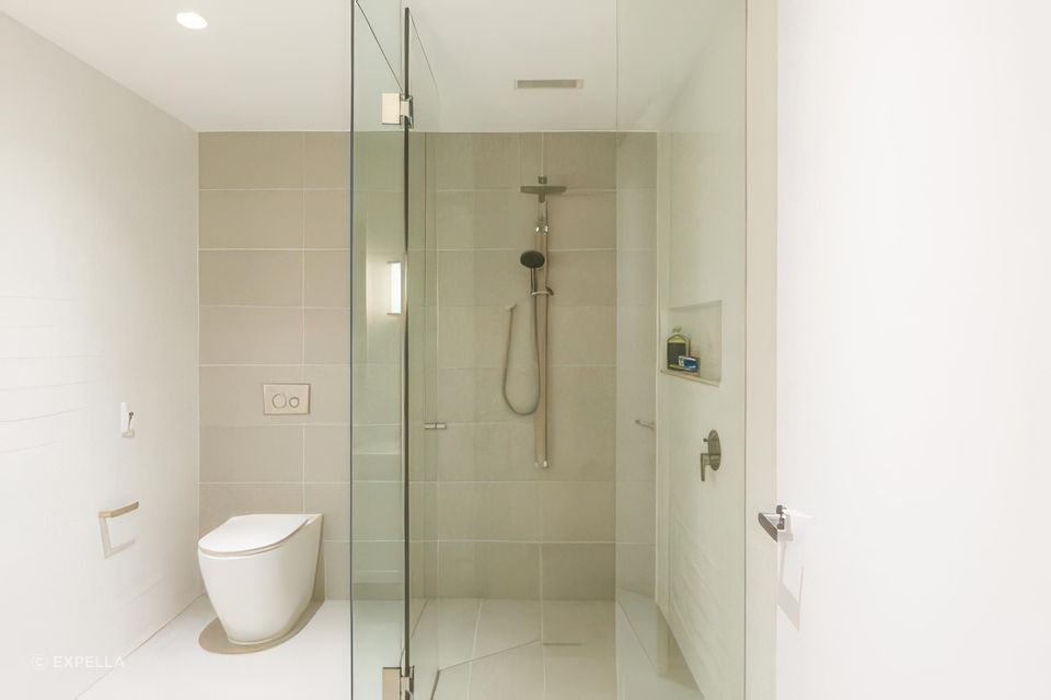 Expella’s Compact Linear Bar Grille sits discreetly over the shower in Montefiore’s high-end bathrooms.