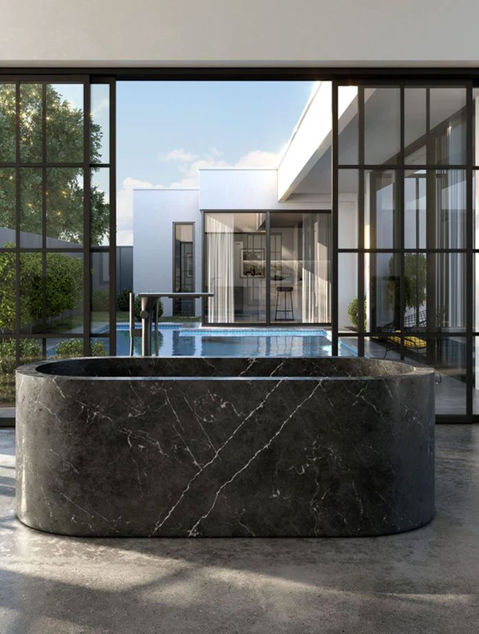 A marble bathtub showcases the mineral hardness of the material.