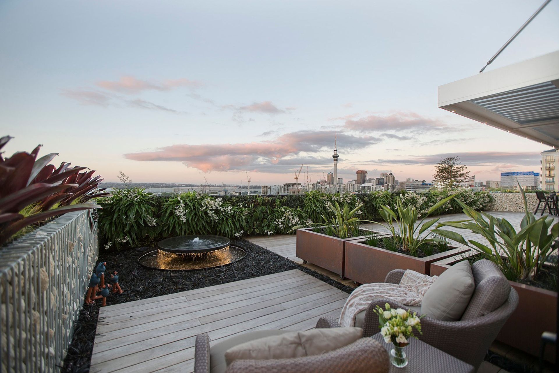 Natural Habitats designed and built a revolutionary rooftop landscape for this private Auckland apartment, which features city and harbour views and a beautiful green entertaining space that comfortably hosts up to 30 guests.