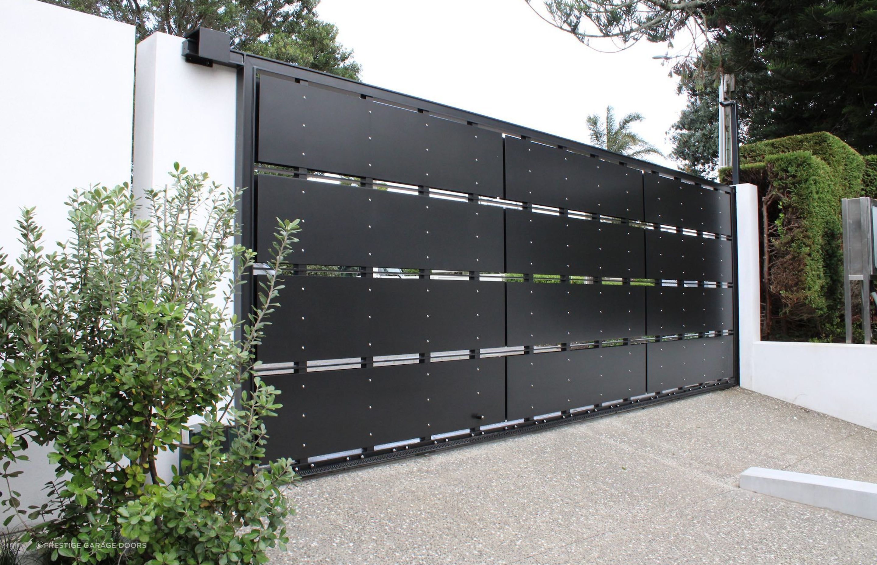 Aluminium Panel Driveway Gate by Prestige Doors &amp; Gates.