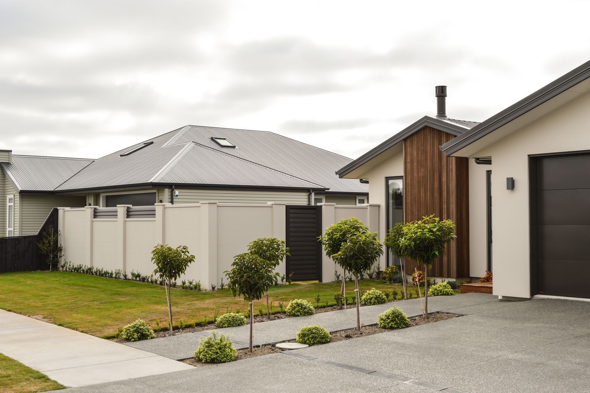 Composite fencing has become a much more eco-friendly solution, seen here with the Elite Wall by Boundaryline.