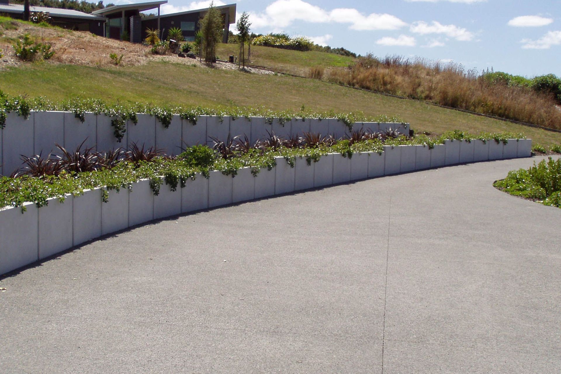 The Lusit Retaining Wall system is a precast concrete engineered wall suitable for a wide variety of ground retention uses.