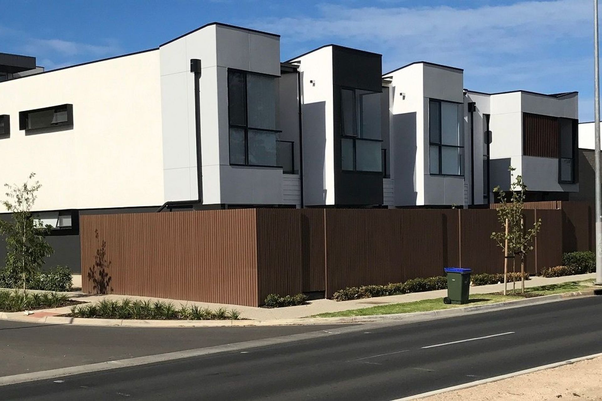 Maintaining friendly neighbour relations is important with shared boundaries like these, showcasing Timber Fence Palings by Timberline.