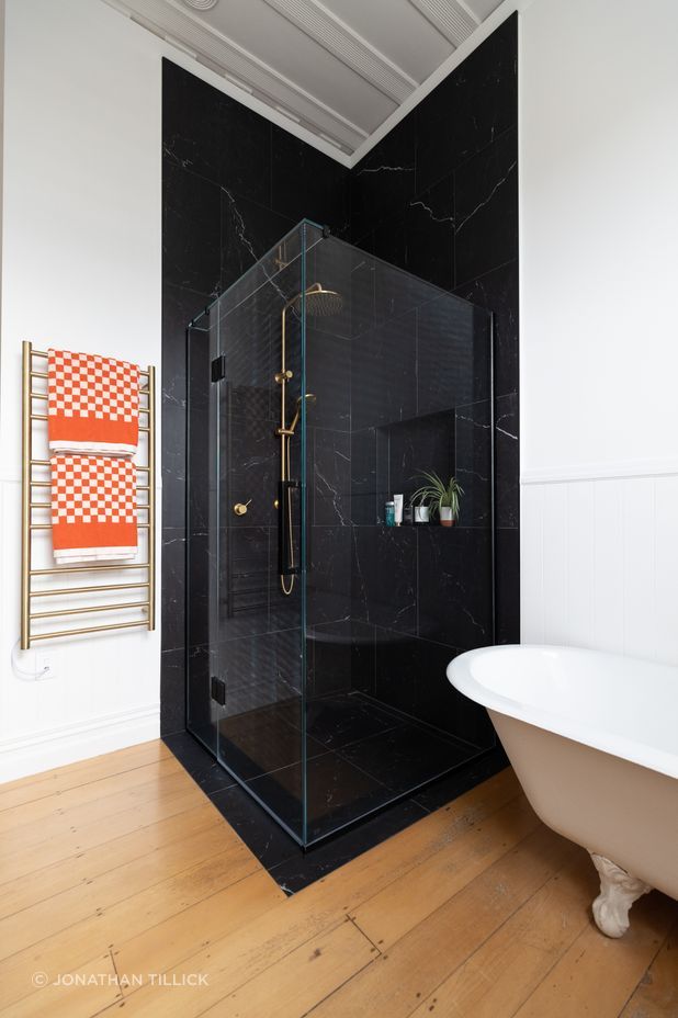 Every detail has been considered, with the Elite Bathroomware Code round heated towel ladder selected in brushed brass.