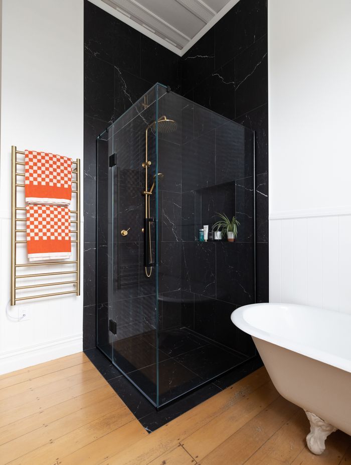 Every detail has been considered, with the Elite Bathroomware Code round heated towel ladder selected in brushed brass.