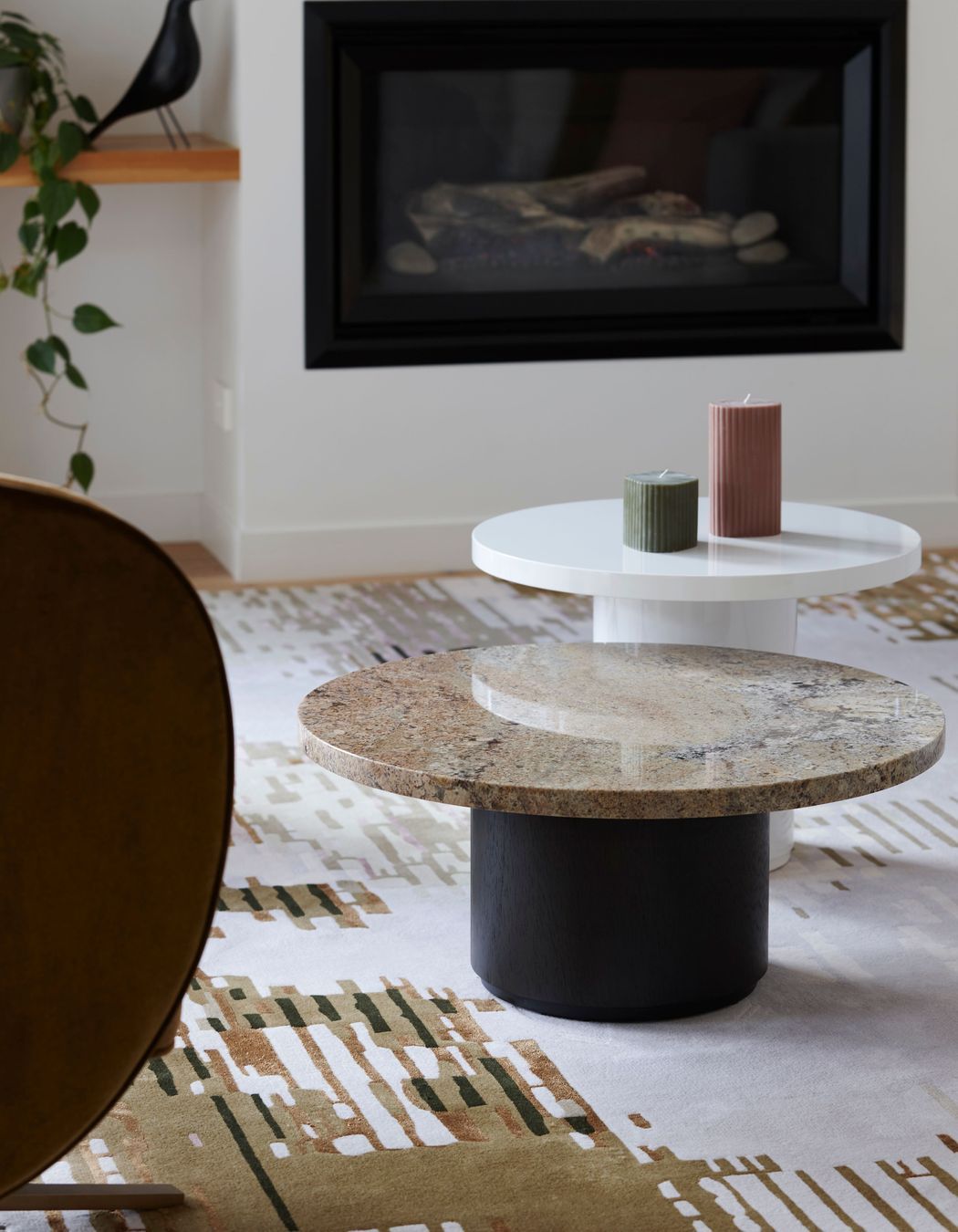 A custom rug designed by Lulu brings the colours of the space together.