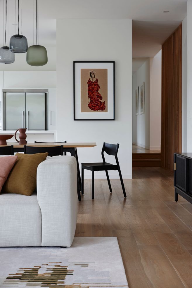 A Tim Webber lounge is a perfect base to the custom cushions and coloured light pendants from Città.