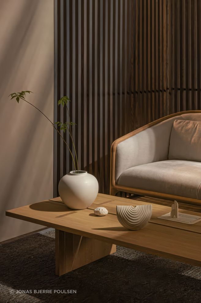 Norman Foster Sofa N-FS01 paired with a slim, rectangular oak coffee table which is not yet released – please enquire for details.