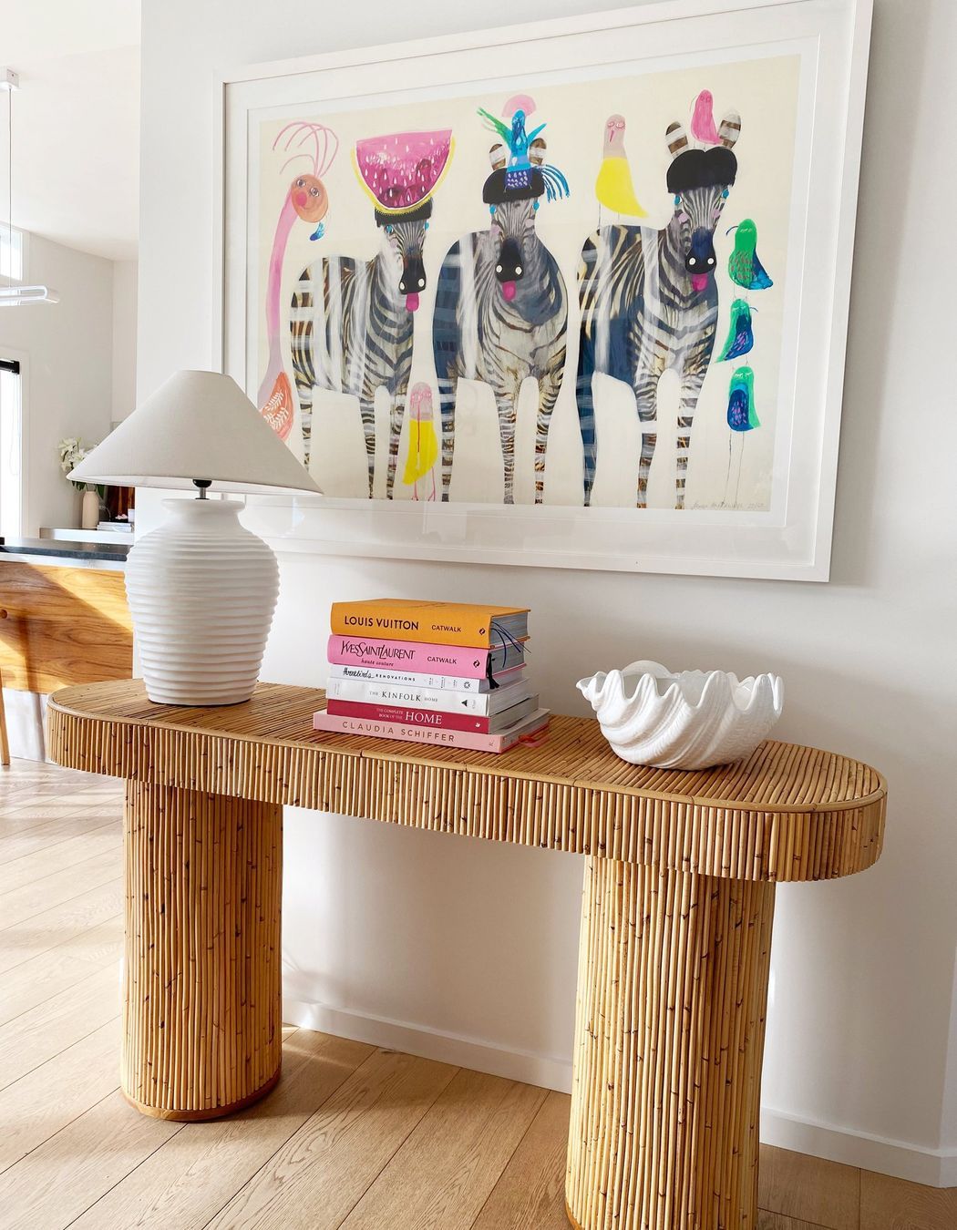 A bamboo side table gives a glimpse of what to expect with the bamboo ceiling.