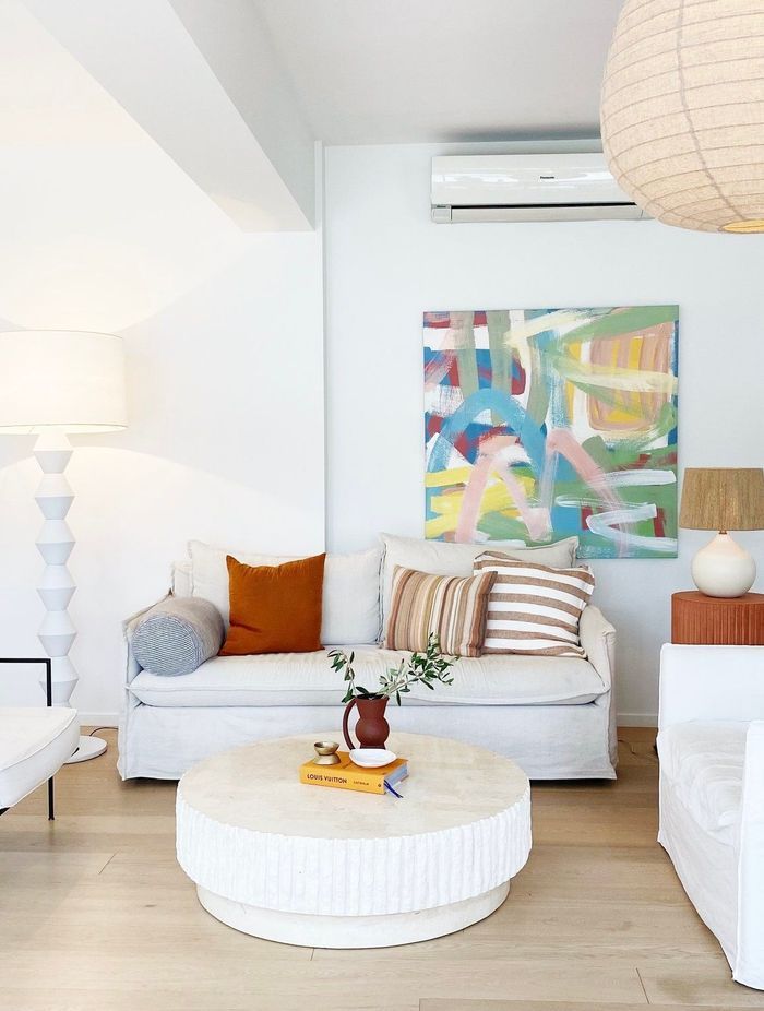 A stone coffee table from David Shaw brings texture to the living area.