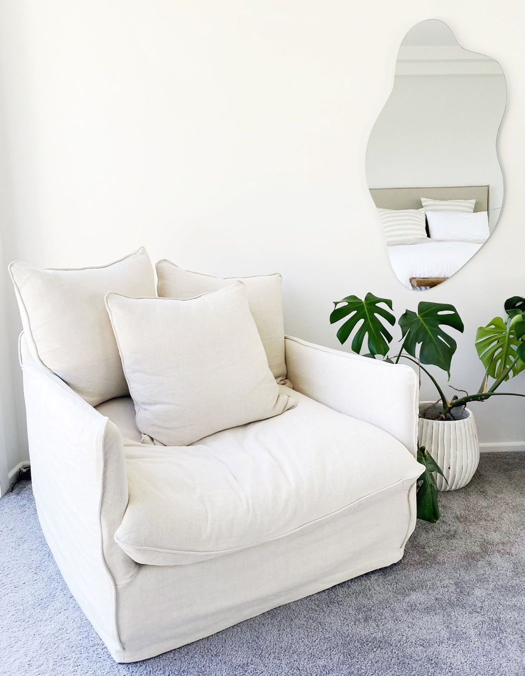 A Made of Tomorrow blob mirror features in the master bedroom.