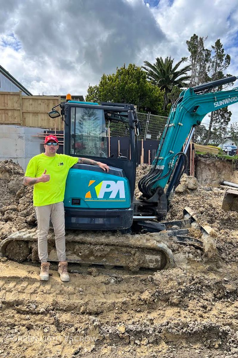 Max pictured on the job with his business KPA Plumbing.