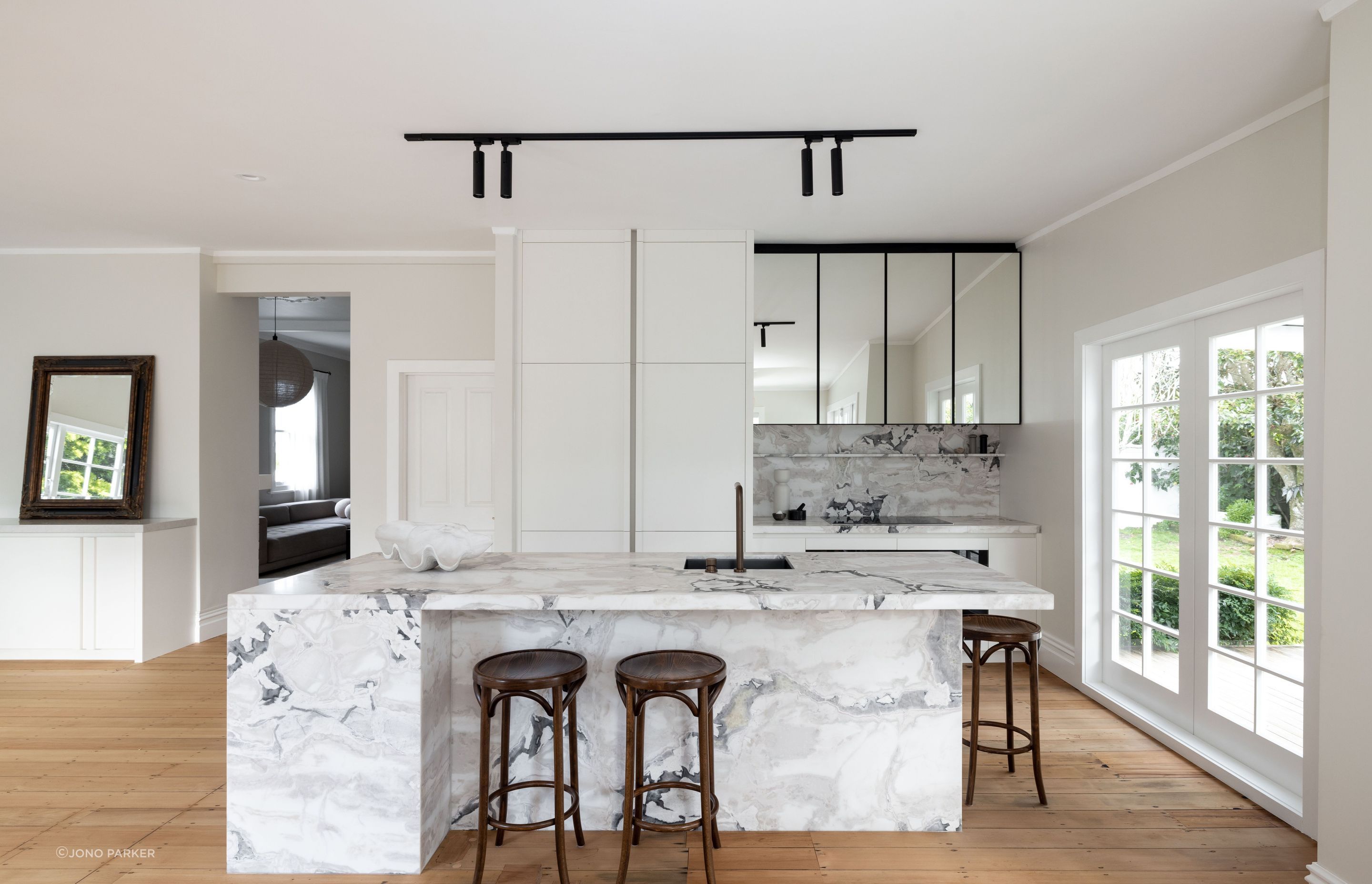 The home's original kauri floorboards have been restored.