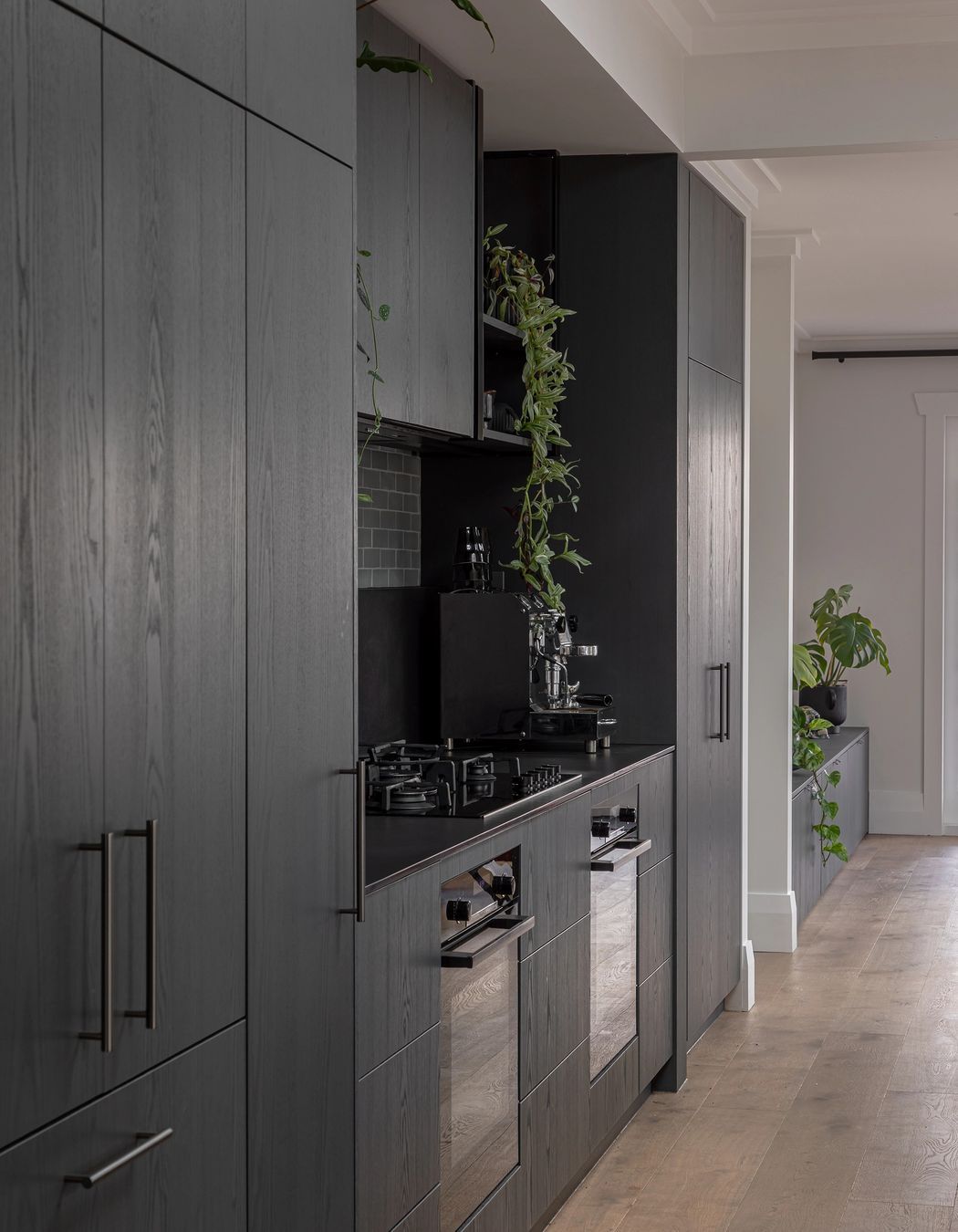 Featuring prefinished dark grey timber veneer cabinetry from VidaSpace. | Photography: John Williams