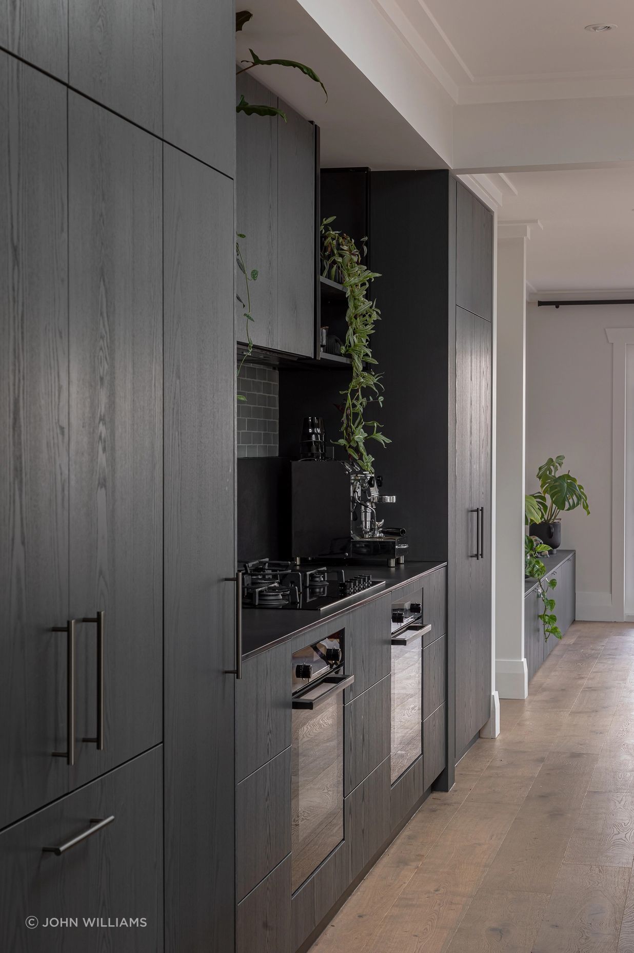 Featuring prefinished dark grey timber veneer cabinetry from VidaSpace. | Photography: John Williams