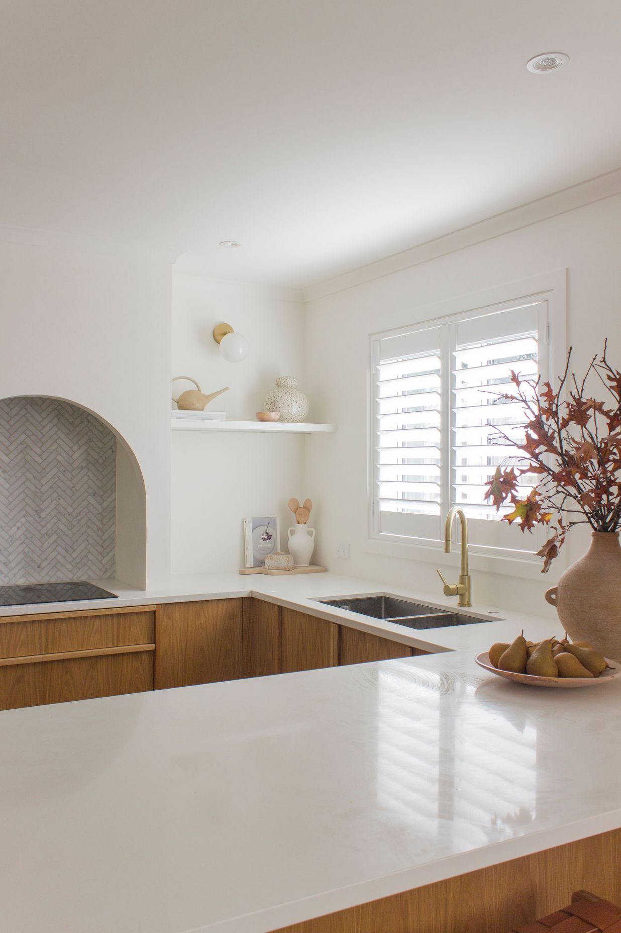 "The arched rangehood was an original design and was in response to some of the space limitations I had to work within."