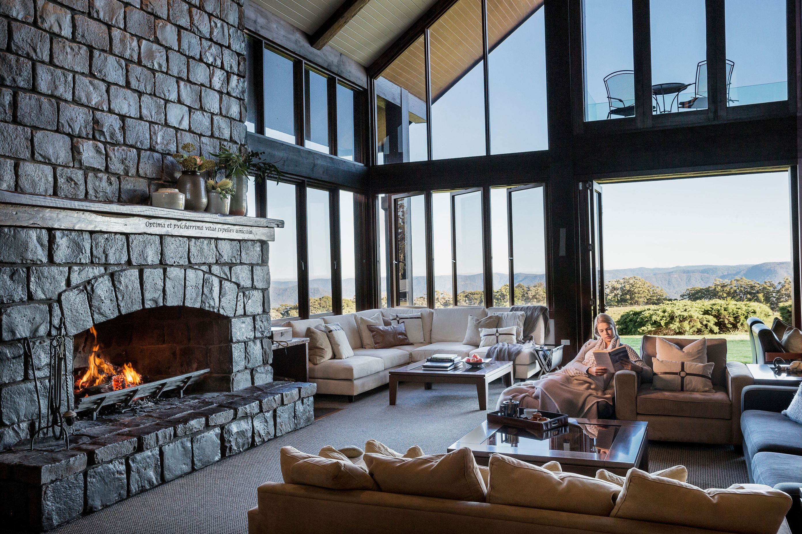In their commitment to luxury, the Spicers' Lodges use Bemboka linen, towels and blankets to give their guests a superior experience. Here, at Spicer's Peak Lodge a guest enjoys a Bemboka wool throw.
