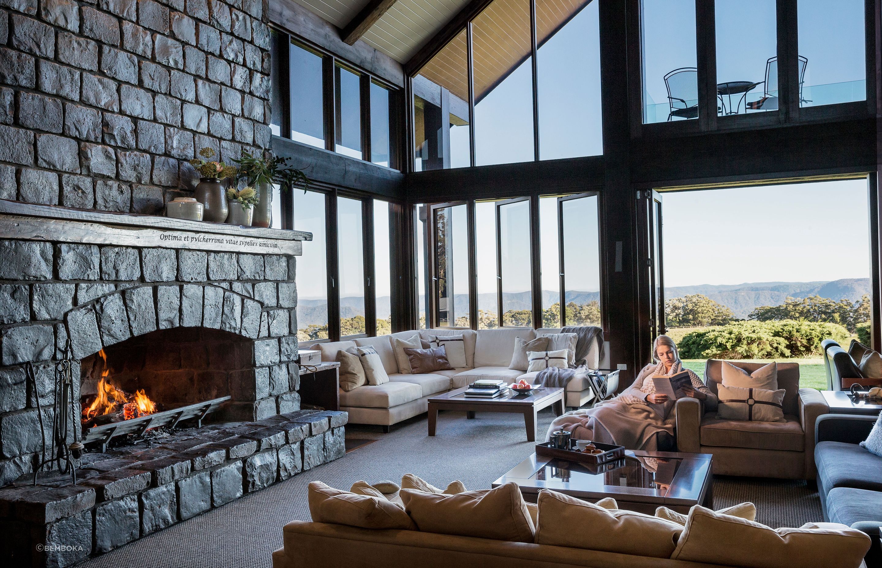 In their commitment to luxury, the Spicers' Lodges use Bemboka linen, towels and blankets to give their guests a superior experience. Here, at Spicer's Peak Lodge a guest enjoys a Bemboka wool throw.