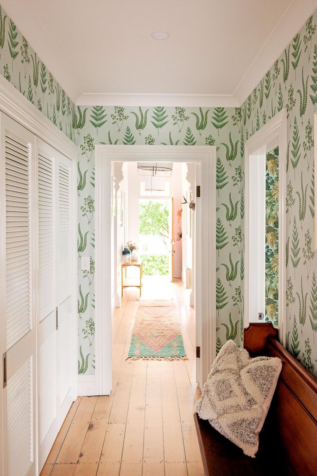 A Bohzali hallway runner adds to the colourful character of this home styled by Hello Saturday.