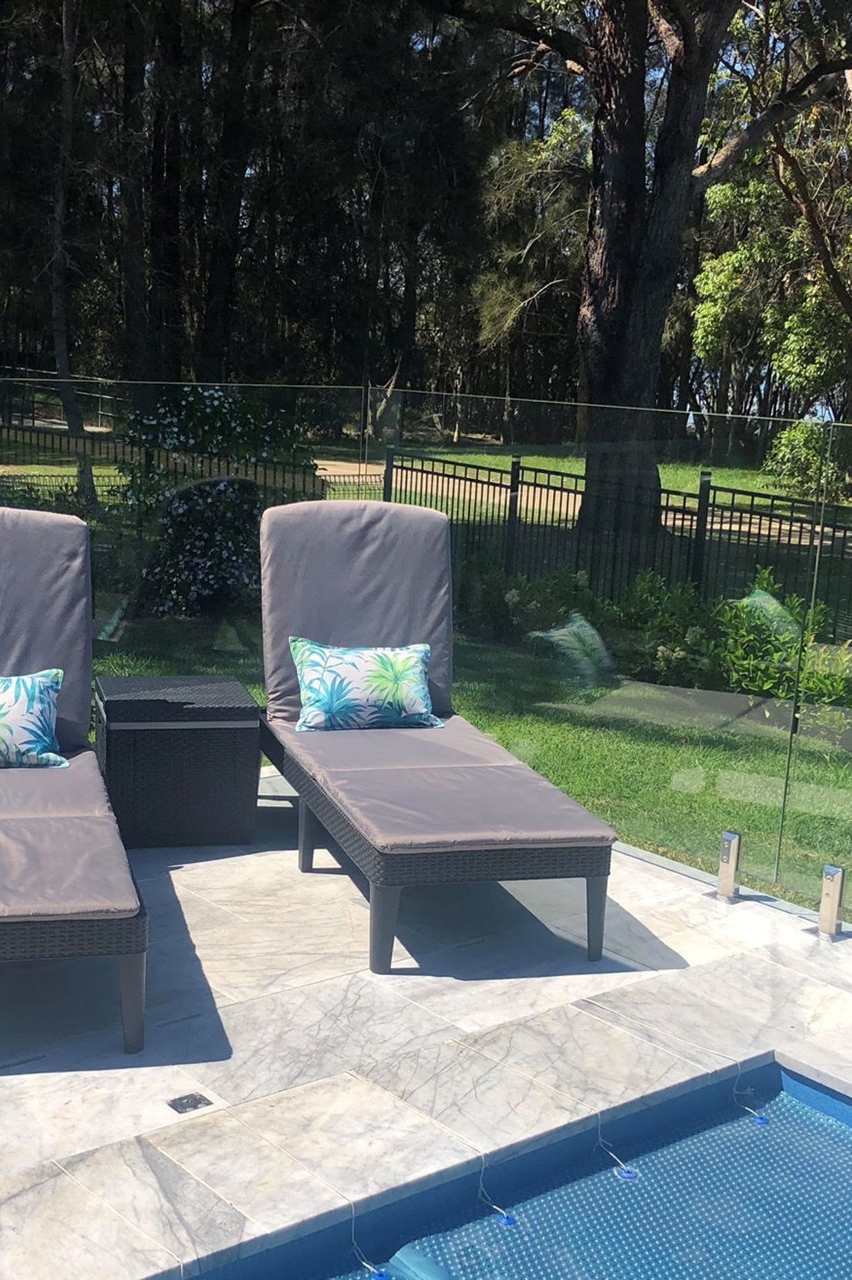 Another advantage of Aussie Undercover's seamless pool covers is furniture can be used on top of them, so you don't lose any space.