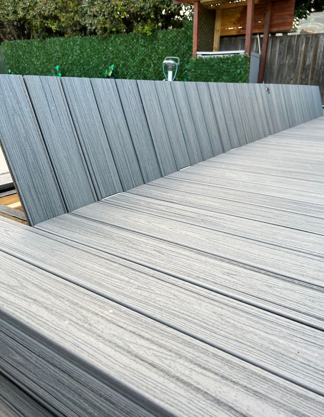 The pool cover lid is easily lifted up for when it needs to be used.