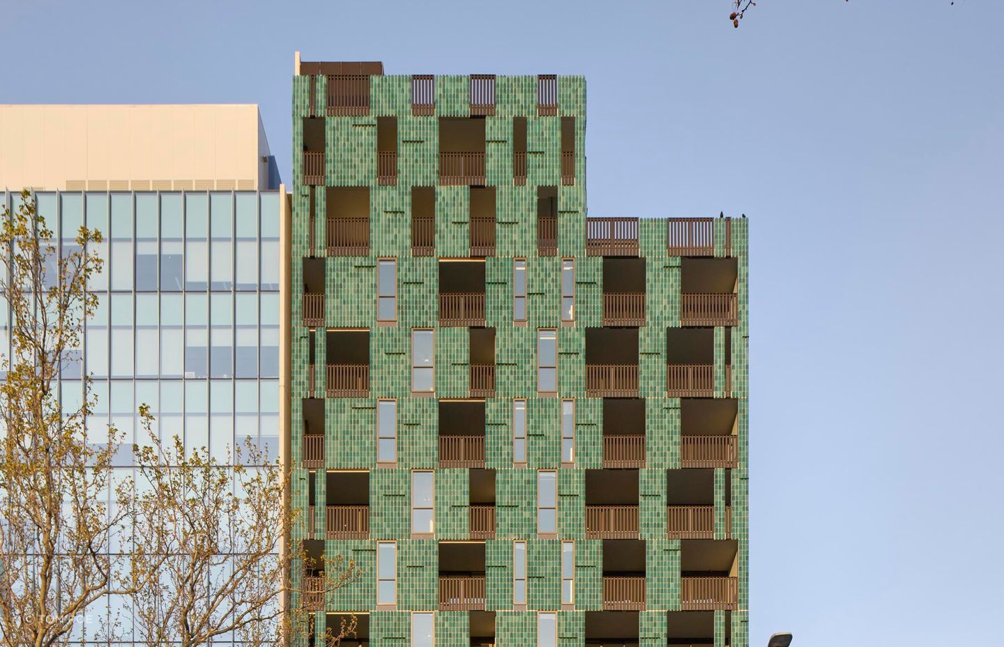 The tiled panels are concertinaed as a nod to the client’s heritage and Chinese ornamental screens. Photography by Tom Roe.
