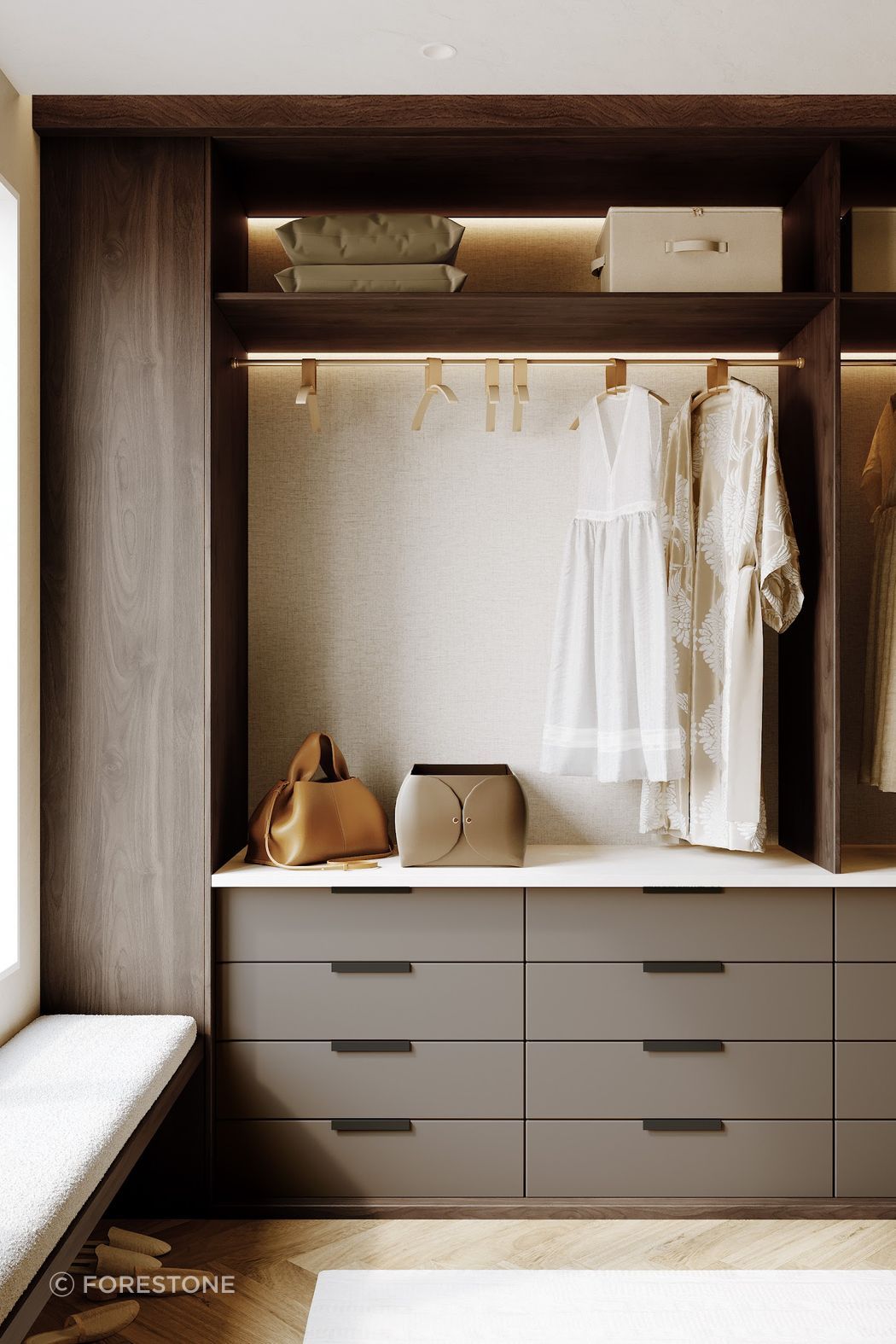 A refined wardrobe detail featuring DesignerOne’s rich woodgrain tones paired with soft, neutral drawer fronts for a beautifully balanced interior finish.