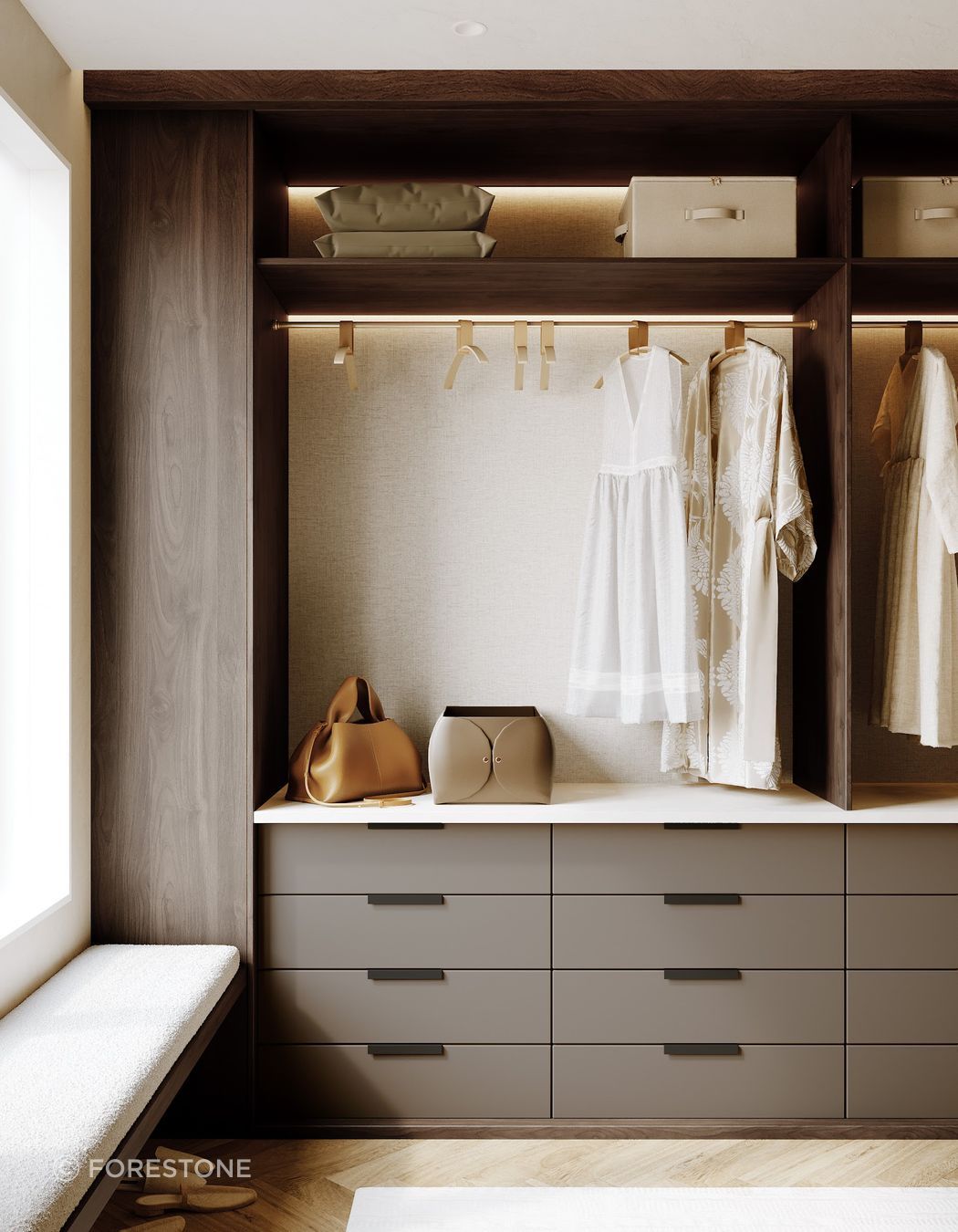 A refined wardrobe detail featuring DesignerOne’s rich woodgrain tones paired with soft, neutral drawer fronts for a beautifully balanced interior finish.