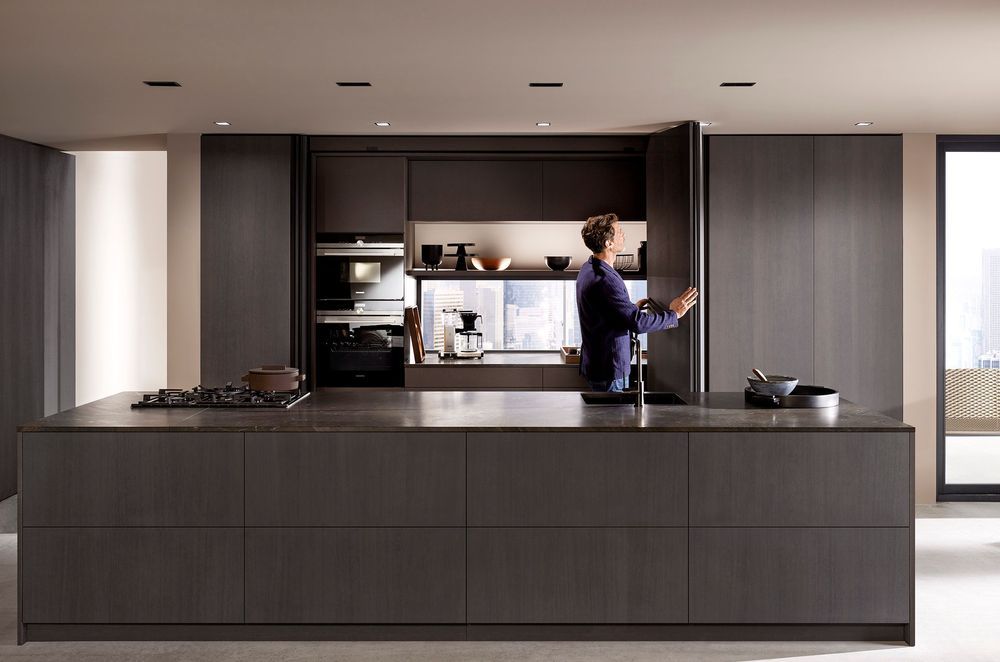Complete with fully integrated technology, the pocket door system supports large fronts from floor to ceiling that challenge the typical design of sliding or pocket doors.