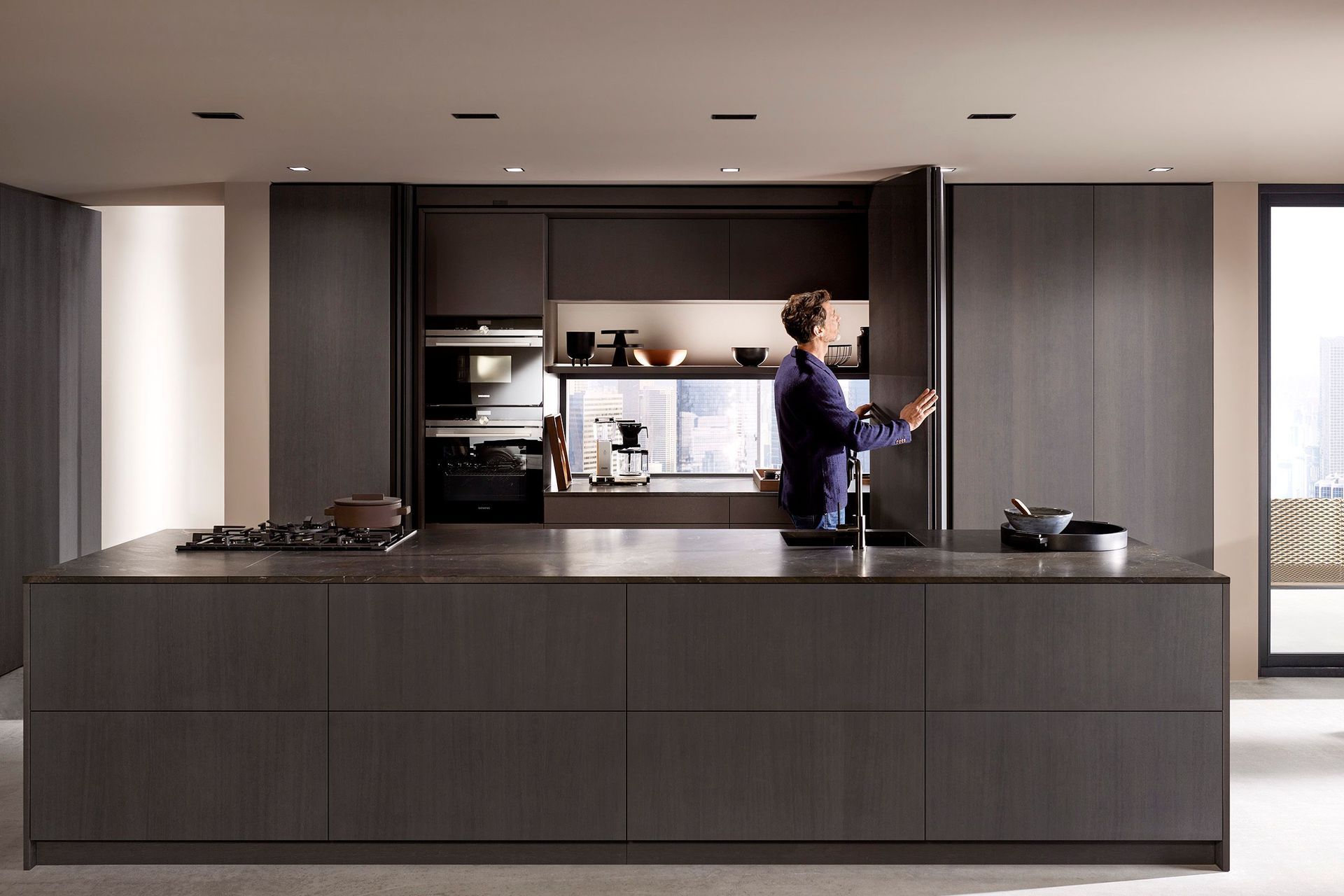 Complete with fully integrated technology, the pocket door system supports large fronts from floor to ceiling that challenge the typical design of sliding or pocket doors.