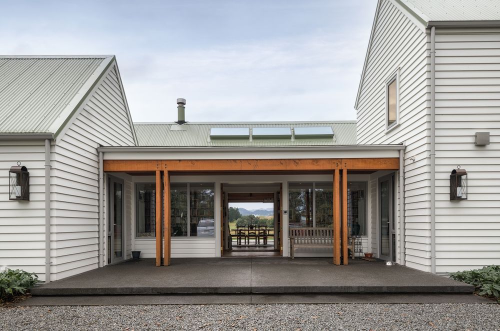 The home’s layout was reimagined. “This gives you that sense of a grand entrance, but because it's on the south side of the house, when you pull up you're not aware of what's beyond,” says Chris.