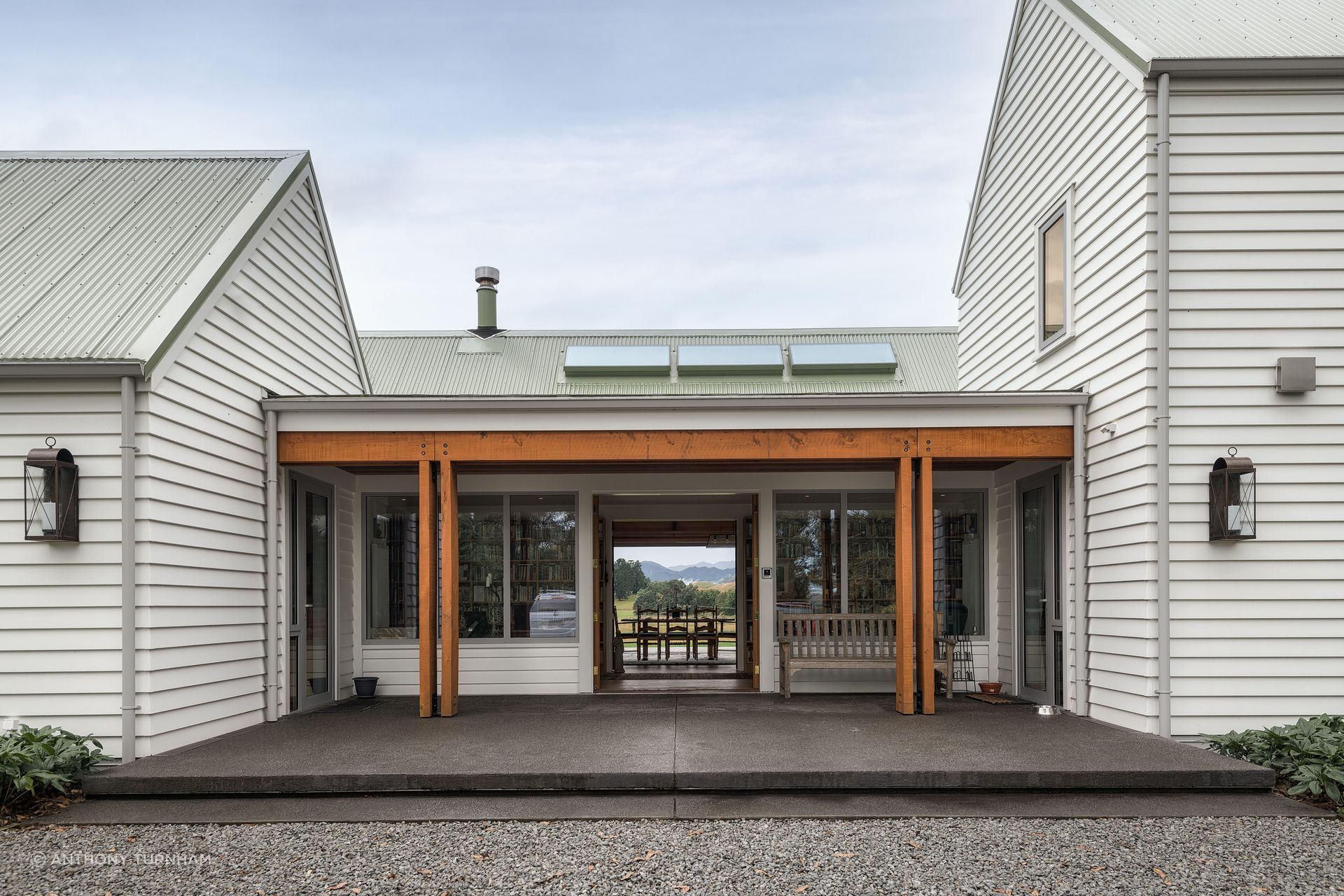The home’s layout was reimagined. “This gives you that sense of a grand entrance, but because it's on the south side of the house, when you pull up you're not aware of what's beyond,” says Chris.