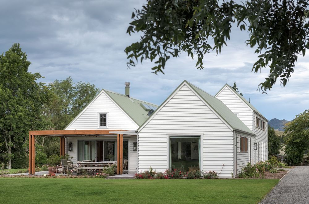 The three main forms of the new homestead. The site is quite remote so builders and contractors would stay during the week in shearers’ quarters during the build. The small leadlight window was saved from the earthquake-damaged house and reused here.