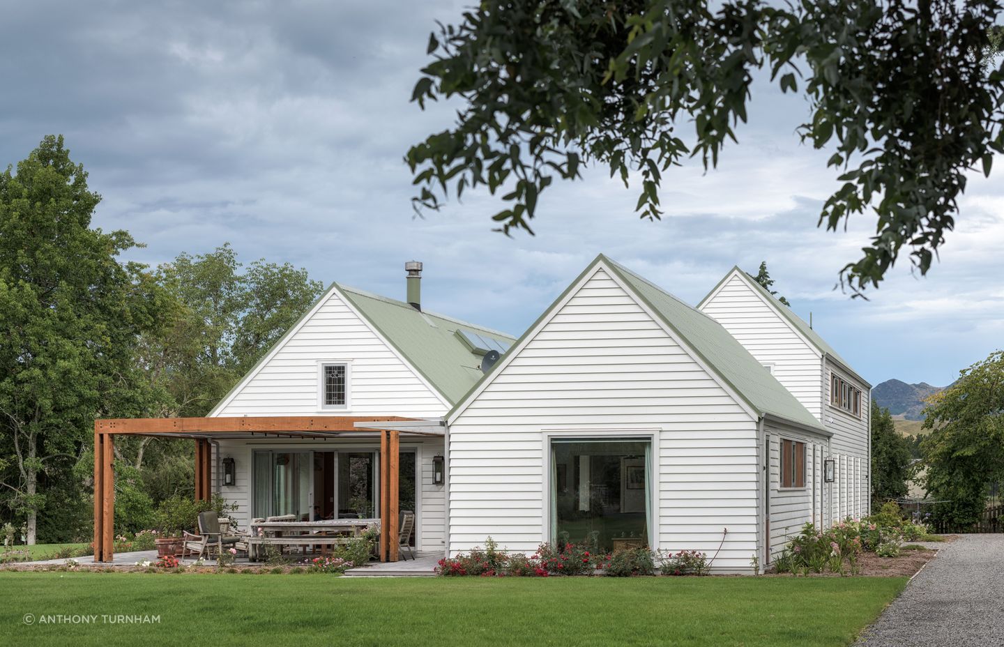 The three main forms of the new homestead. The site is quite remote so builders and contractors would stay during the week in shearers’ quarters during the build. The small leadlight window was saved from the earthquake-damaged house and reused here.