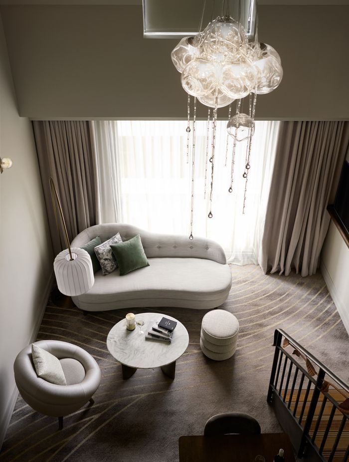 The loft suites have a mezzanine level, with the bedroom upstairs.