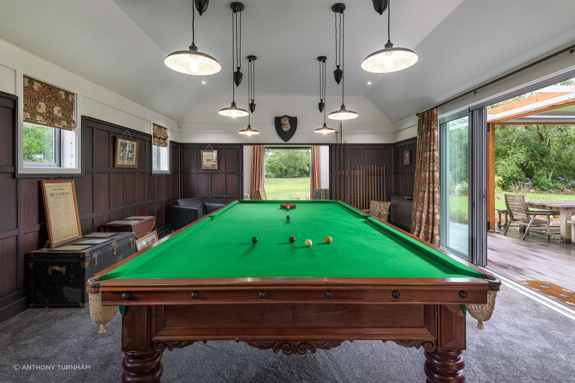 The billiards room harks back to traditional forms of entertainment, says Chris. “And it just provides a really nice space to be in.”