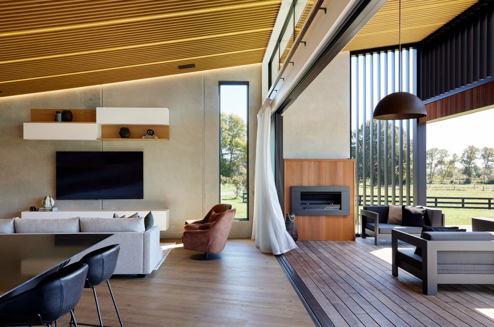 The covered deck area connects seamlessly with the open-plan kitchen, living and dining.