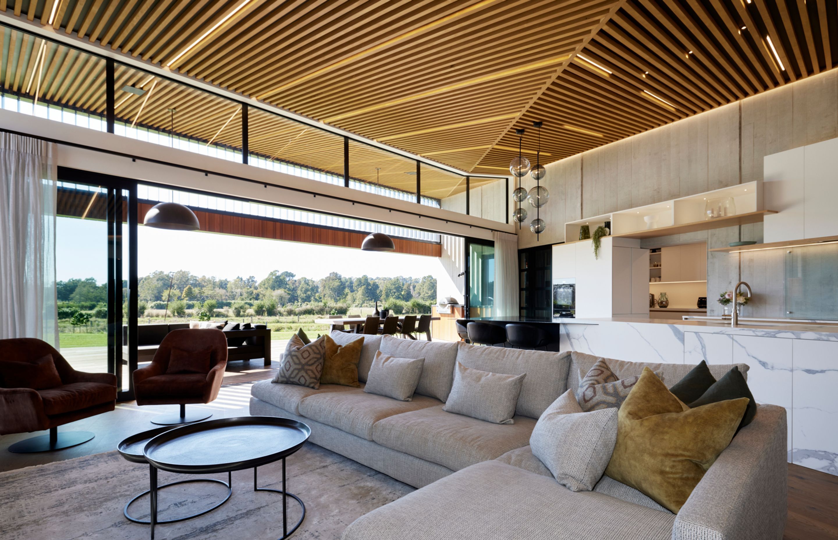 The cedar ceiling extends from inside to out.