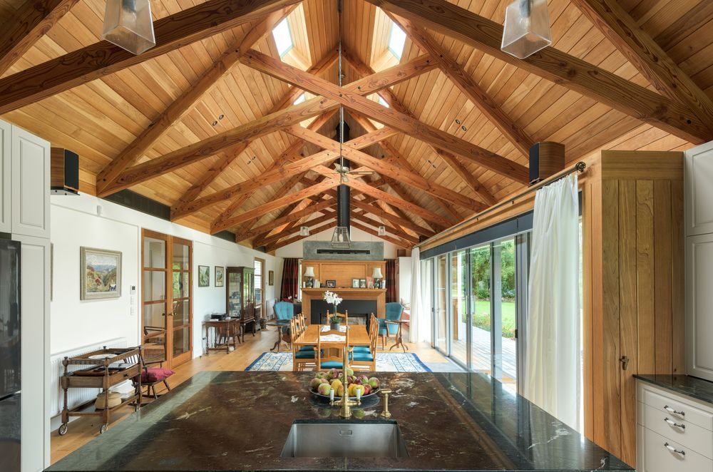 The great room. “We wanted to have a decent volume and make a feature of the ceiling and the structure. When you get into designing big houses you want some spaces that match the scale,” says Chris.