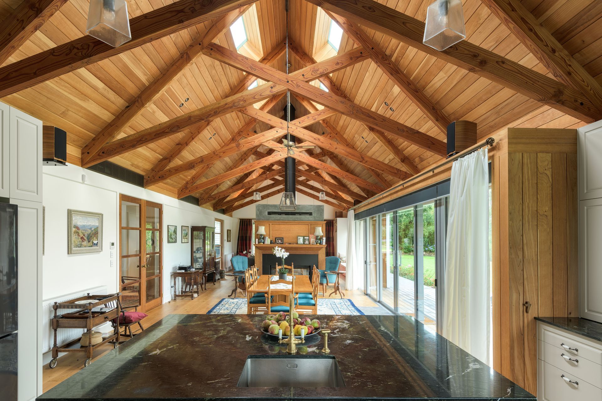 The great room. “We wanted to have a decent volume and make a feature of the ceiling and the structure. When you get into designing big houses you want some spaces that match the scale,” says Chris.