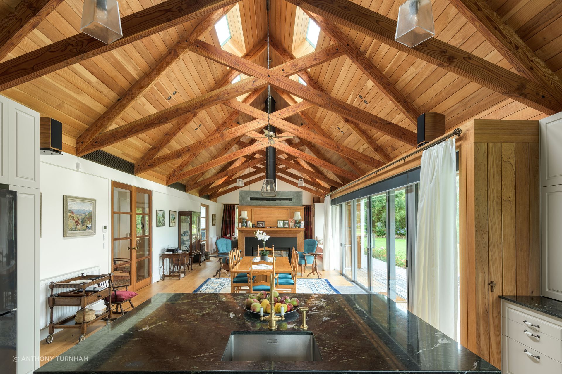 The great room. “We wanted to have a decent volume and make a feature of the ceiling and the structure. When you get into designing big houses you want some spaces that match the scale,” says Chris.