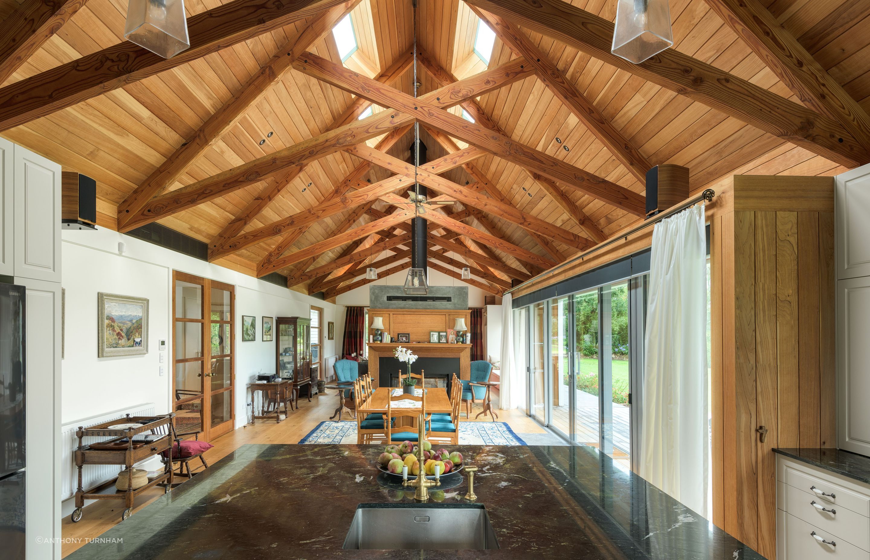 The great room. “We wanted to have a decent volume and make a feature of the ceiling and the structure. When you get into designing big houses you want some spaces that match the scale,” says Chris.