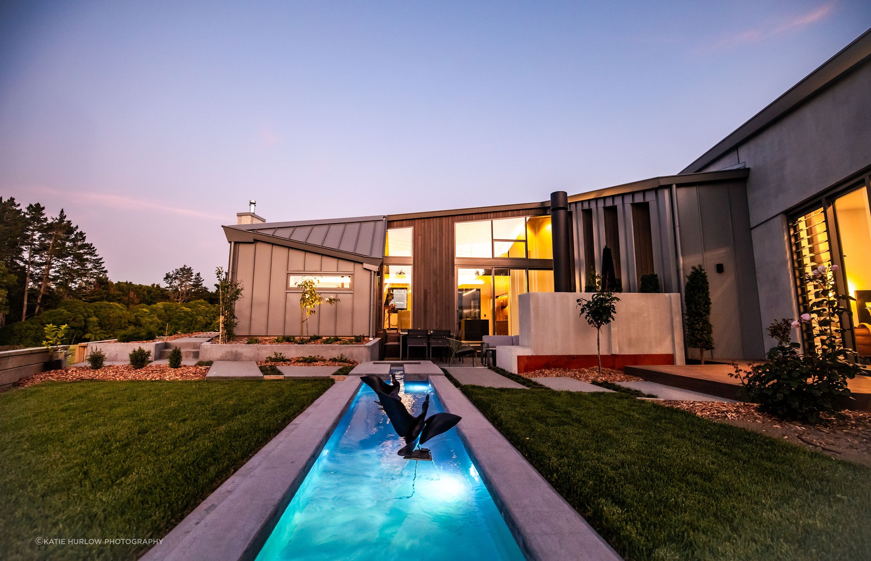 A long water feature imitates the river, and can be seen from the north-facing living spaces.