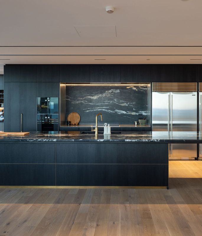 This coastal penthouse impresses with its contemporary design and panoramic outlook