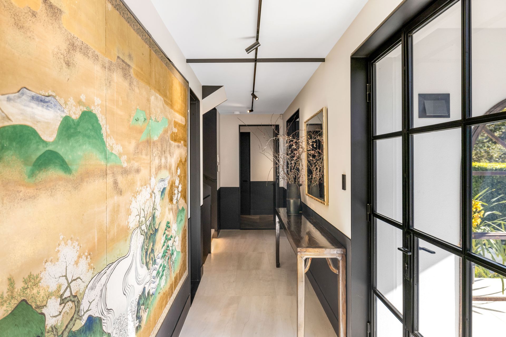 The entry hall features a two-tone treatment.