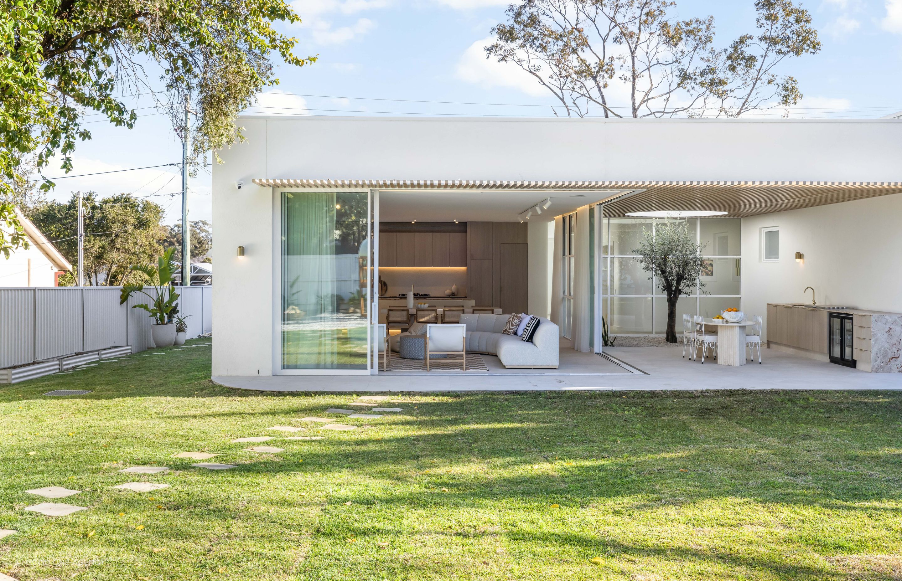 The rear of the home opens to the backyard and seamlessly transitions to the covered external courtyard.